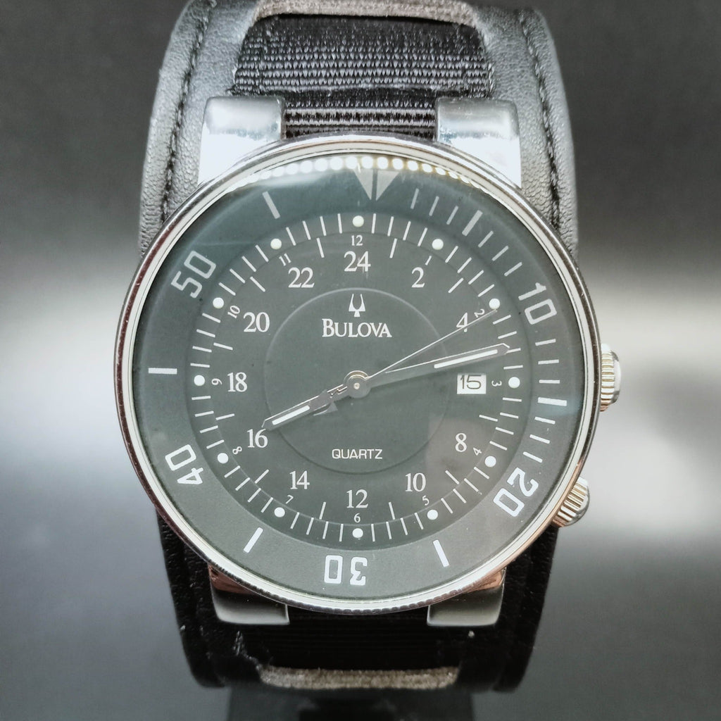 Discontinued Bulova Model BVM004 In-Built Rotating Bezel Quartz Watch (OH)